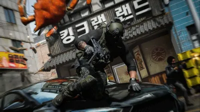 Soldier on a car roof aiming down a neon-lit street